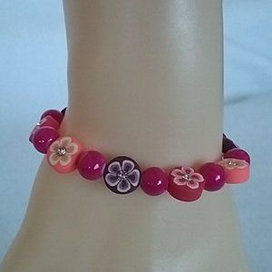 Hot pink and flowers beaded stretch bracelet